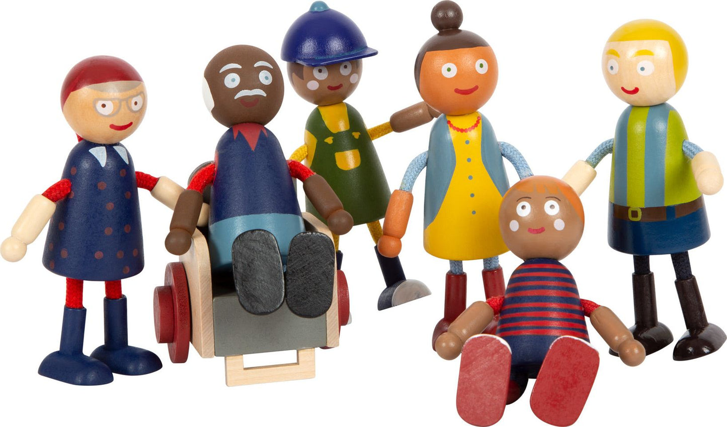 Biegepuppen-Familie mit Rollstuhl