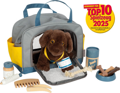 Hund oder Katze mit Tasche und Pflege-Set