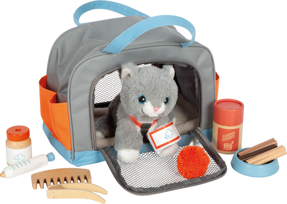 Hund oder Katze mit Tasche und Pflege-Set