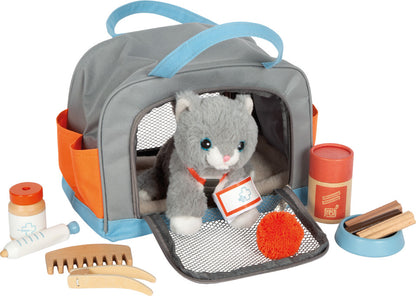 Hund oder Katze mit Tasche und Pflege-Set