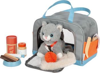 Hund oder Katze mit Tasche und Pflege-Set